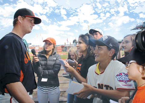 Image of our FastForwad reporters listening to pitcher Matt Cain